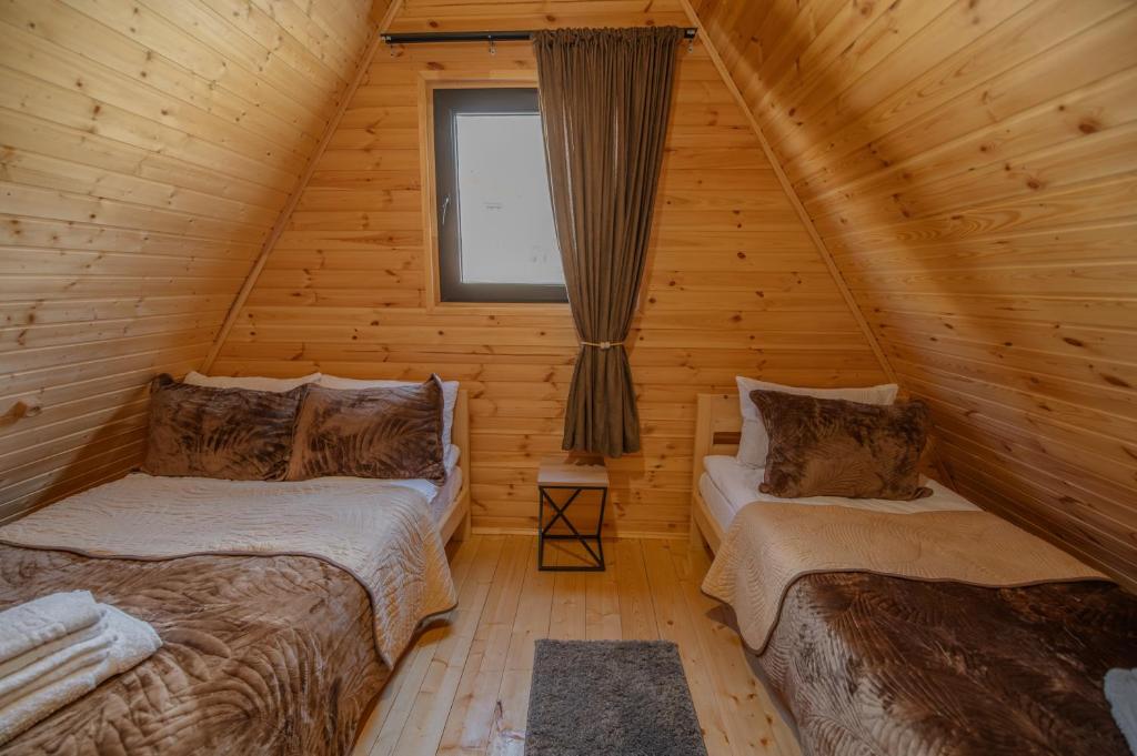 Una cama o camas en una habitación de Peak cottage Kazbegi