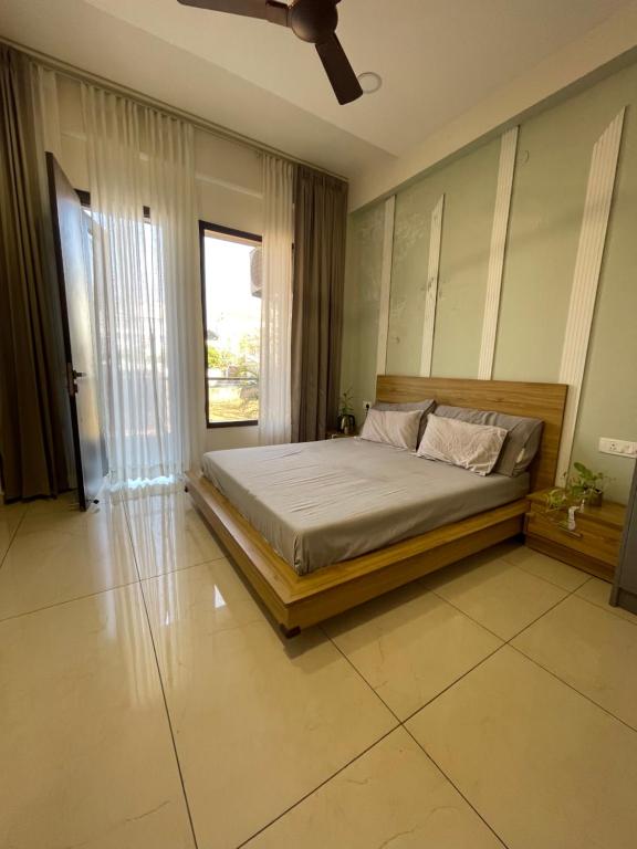 En eller flere senge i et værelse på Nook By The Valley