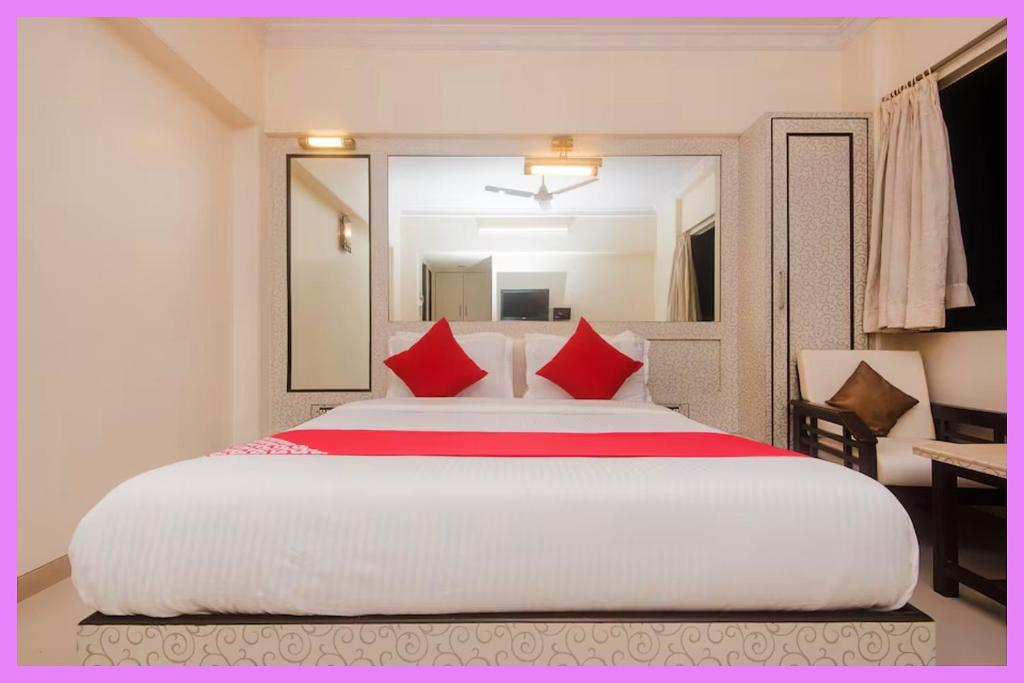 En eller flere senge i et værelse på Hotel Golden Sky Premium