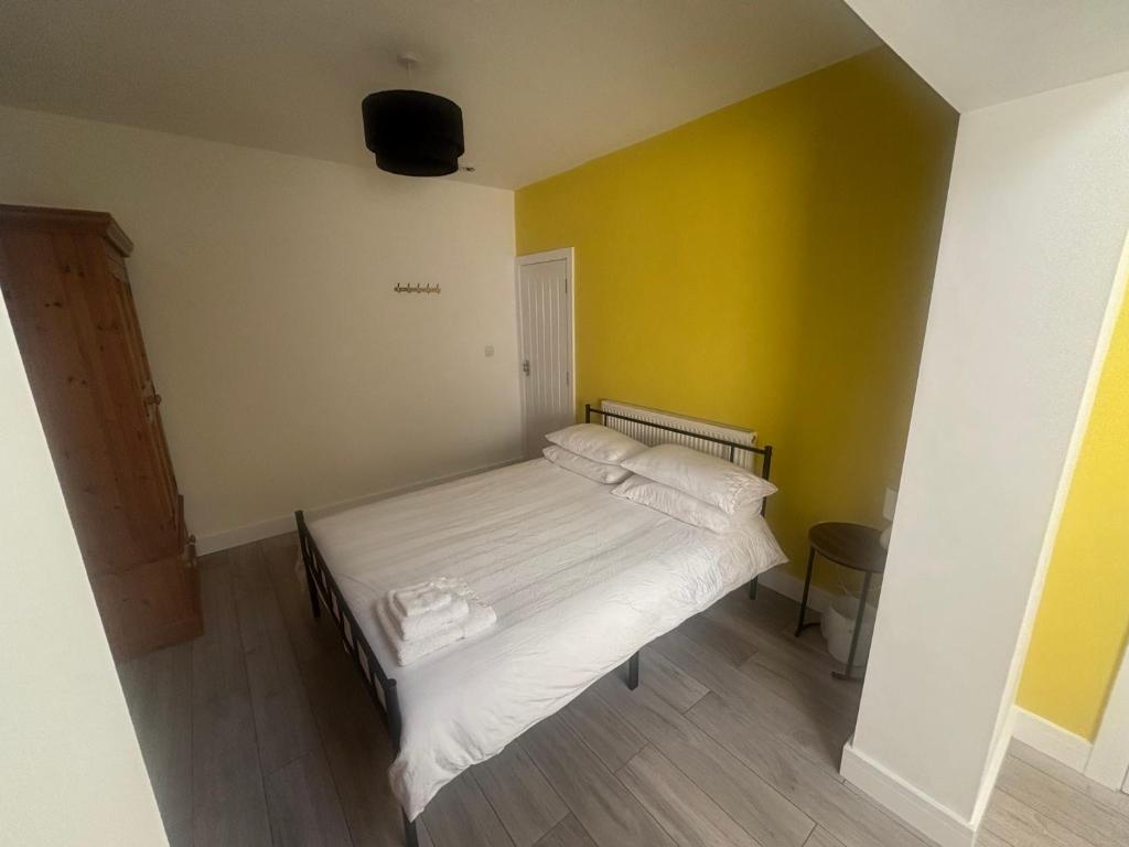 Postel nebo postele na pokoji v ubytování Kane's Place