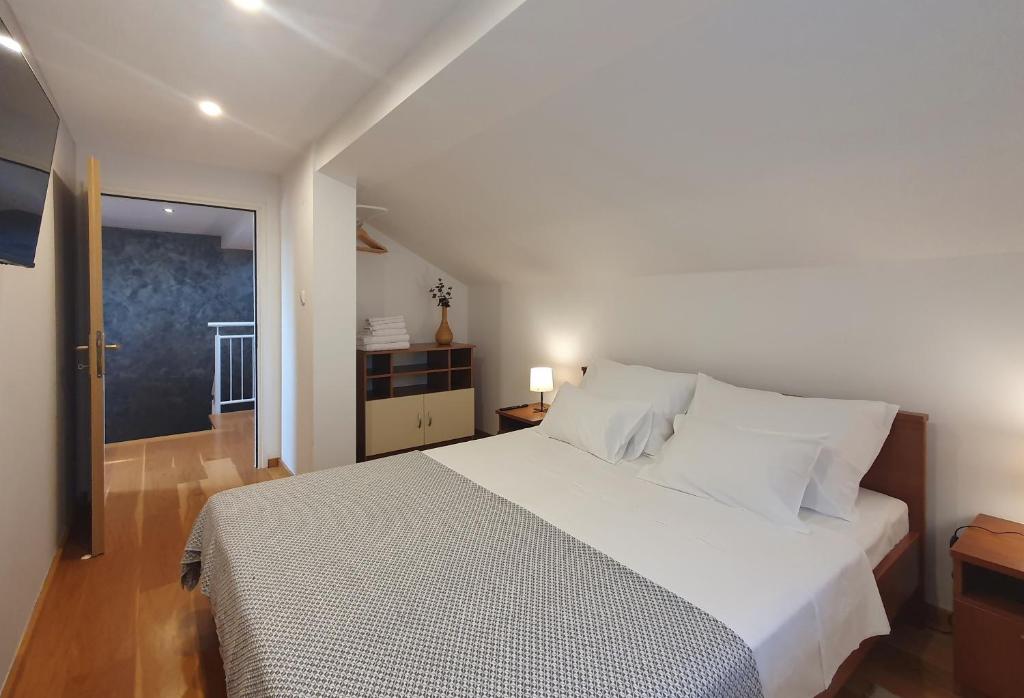 En eller flere senge i et værelse på Trlababaland by GREEN Croatia