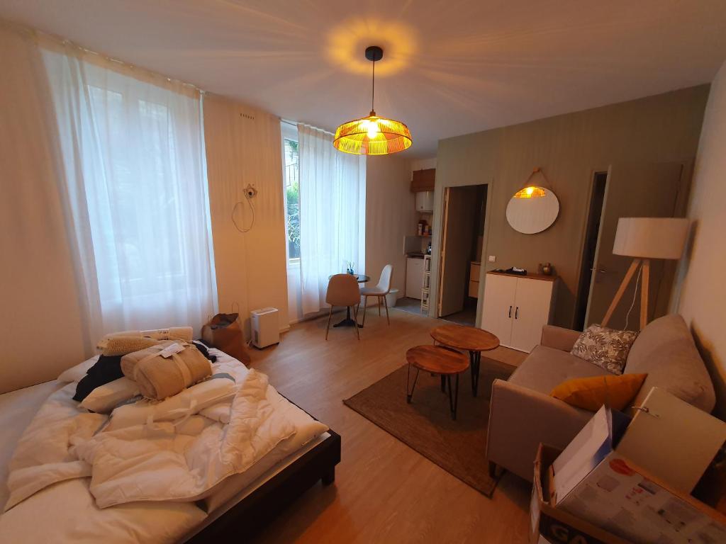 En eller flere senge i et værelse på Studio hyper centre Caen