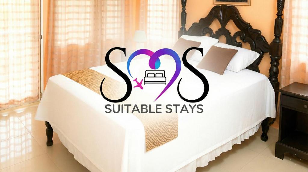 Un logotipo para una suite en Subolulu Stays. en Prime Location Villa -Private Pool & Gym -Sleeps 7, en Richmond