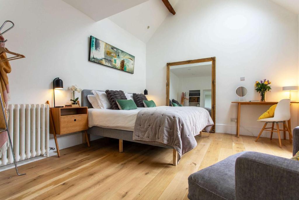 En eller flere senge i et værelse på Delightful countryside retreat