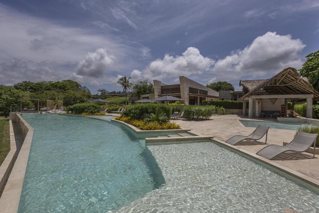 an image of a swimming pool at a villa at 2BR apartment with balcony and amazing views in Pendales