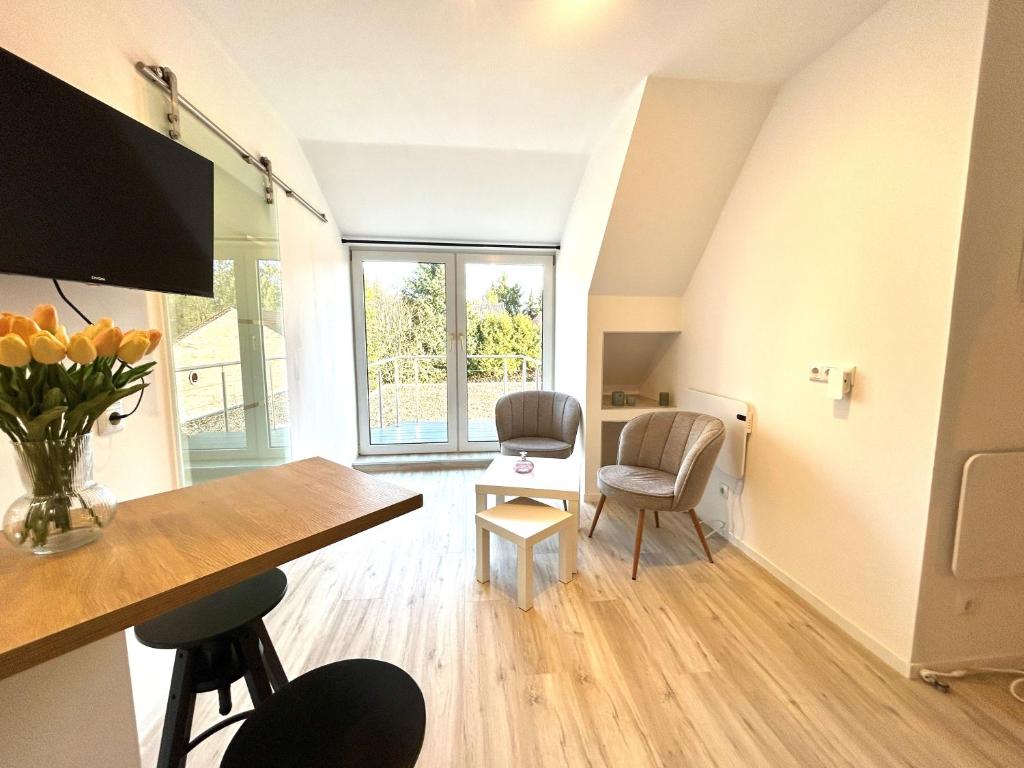 Гостиная зона в Ferienwohnung Loft Kirchdorf