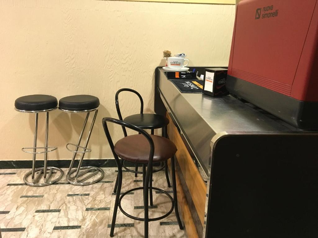 Kuchyň nebo kuchyňský kout v ubytování Hotel Bolognese