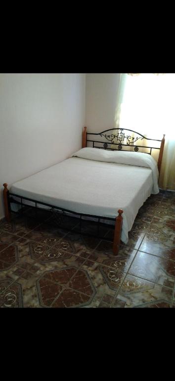 Giường trong phòng chung tại Awesome Mountains Views