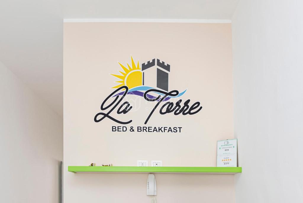 Chứng chỉ, giải thưởng, bảng hiệu hoặc các tài liệu khác trưng bày tại La Torre Apartments