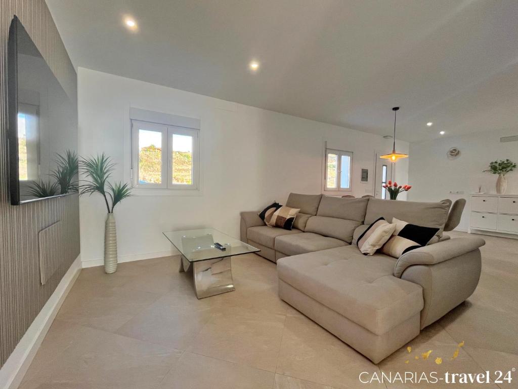 TV a/nebo společenská místnost v ubytování Los Roquitos II