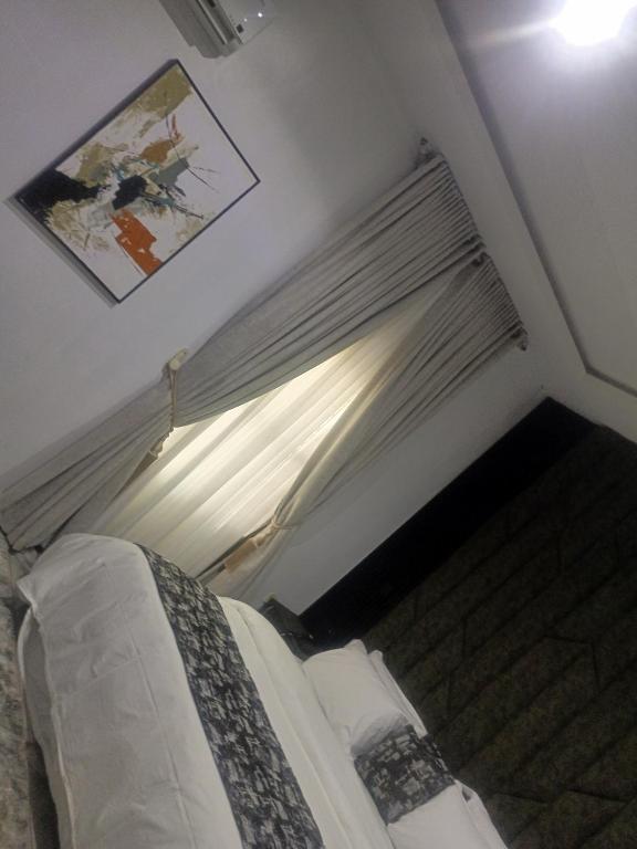 Ένα ή περισσότερα κρεβάτια σε δωμάτιο στο House 30 Apartment