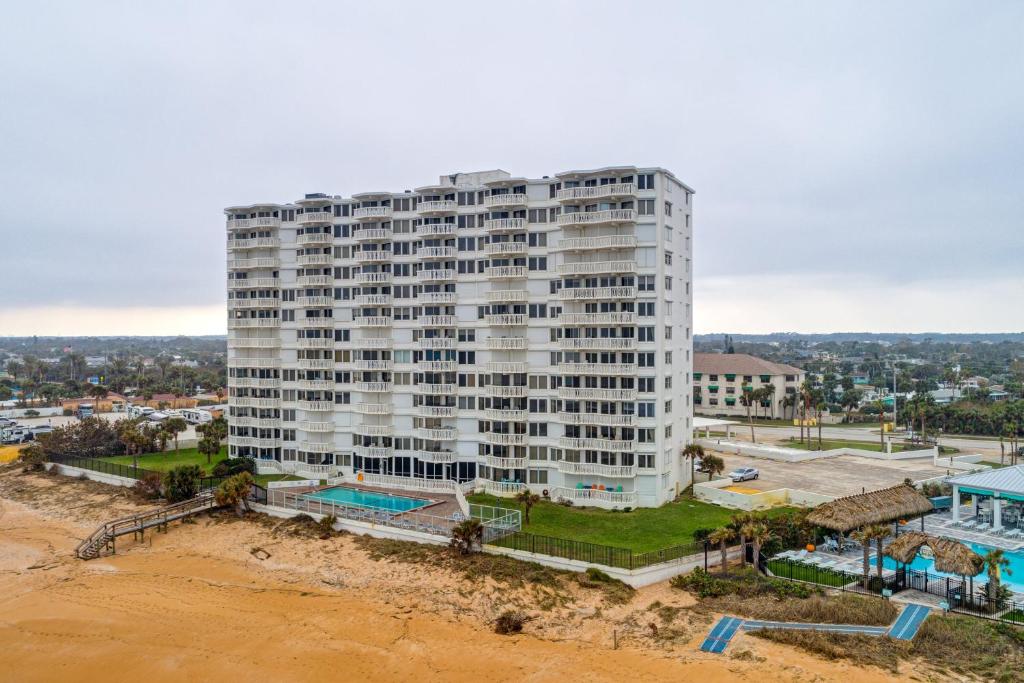 an aerial view of a tall white building at Van Lee 1003 - Oceanview Beach Condo in Ormond Beach