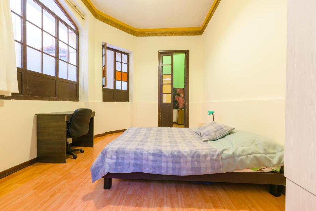 Postel nebo postele na pokoji v ubytování Casa del Sol