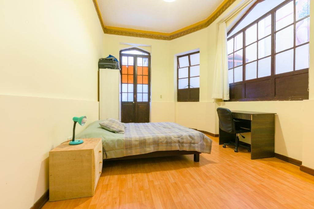 Postel nebo postele na pokoji v ubytování Casa del Sol