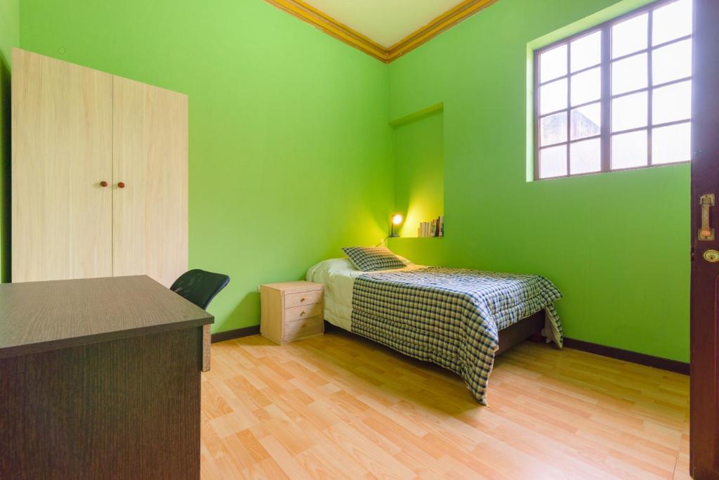 Postel nebo postele na pokoji v ubytování Casa del Sol