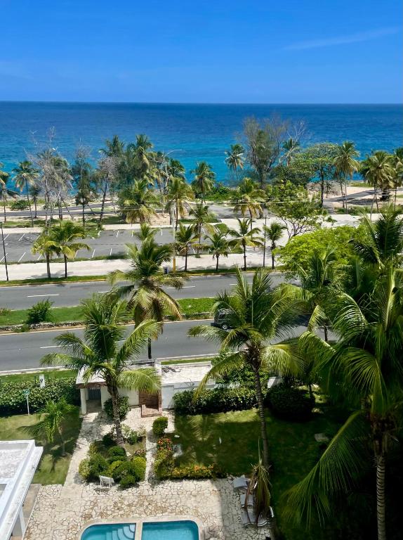 a view of the ocean from the balcony of a resort at Malecón view mar apartment in Colorado