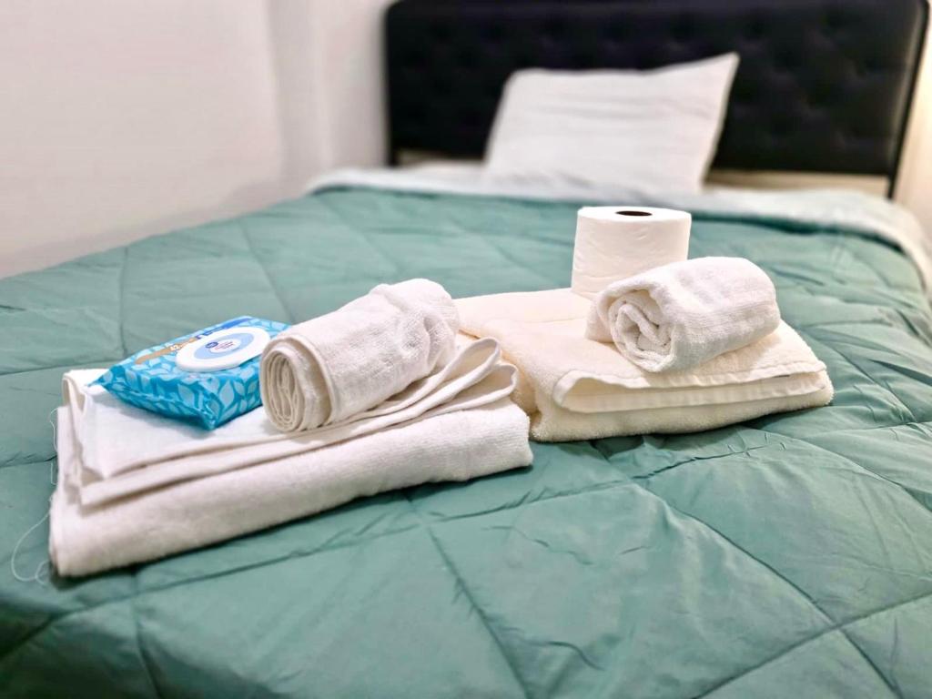 Giường trong phòng chung tại Cute Private Room Full Bed