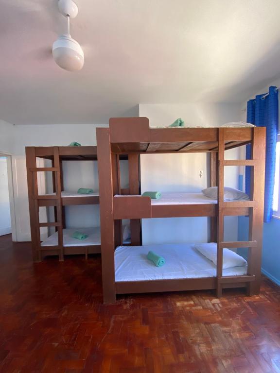 En eller flere senge i et værelse på La Brisa House