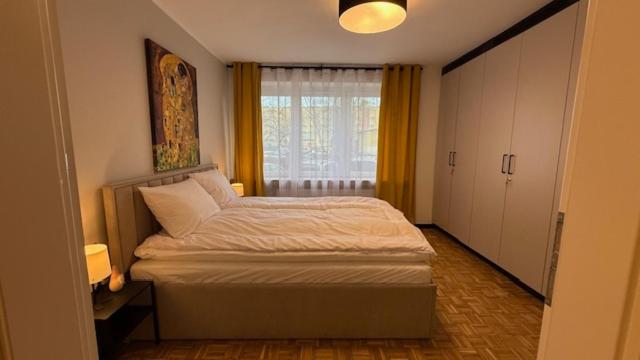 Postel nebo postele na pokoji v ubytování W Centrum