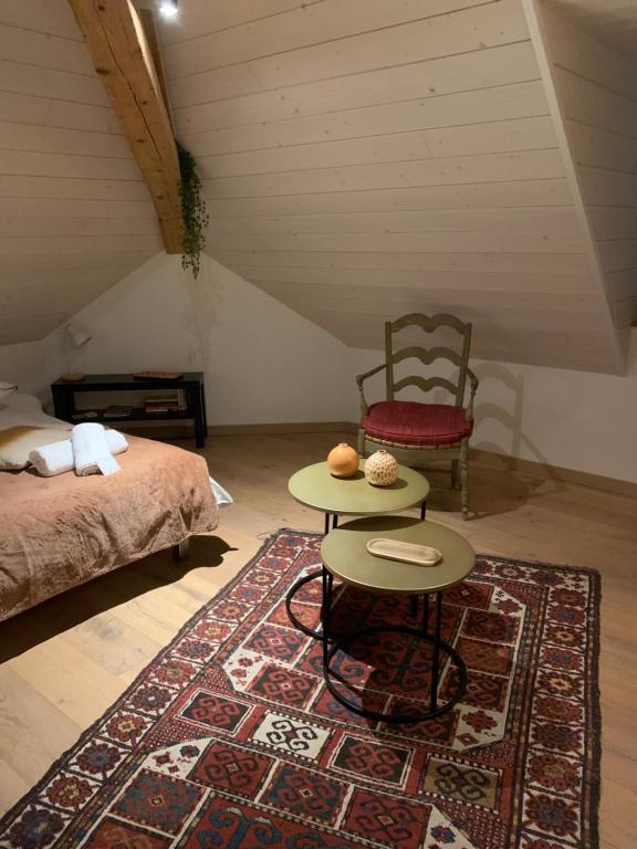 En eller flere senge i et værelse på Studio au cœur du centre ville