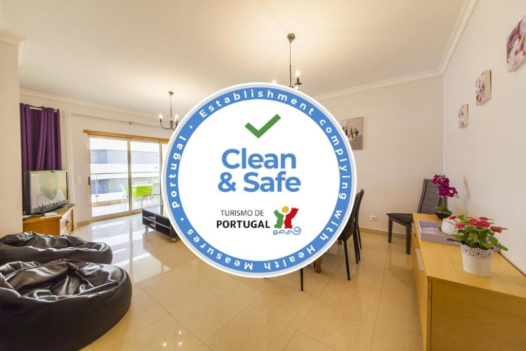 a sign for clean and safe in a room at C05 - Convento Apartment in Lagos