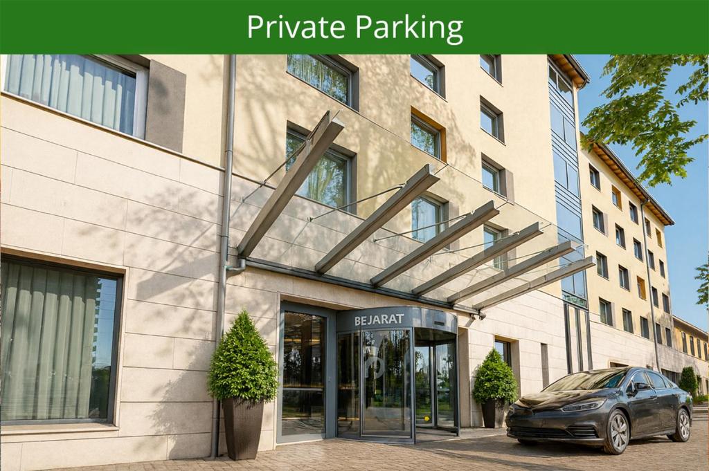 a car parked in front of a building at Ferenc Hotel Budapest in Budapest