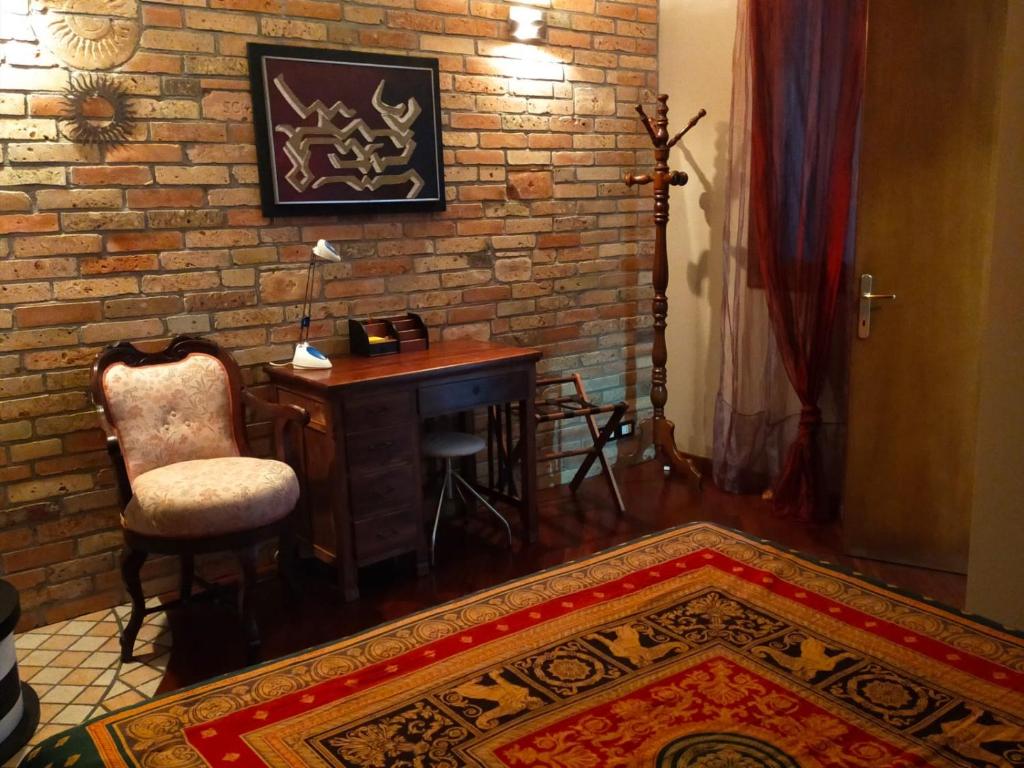 O zonă de relaxare la La tua casa meravigliosa con giardino