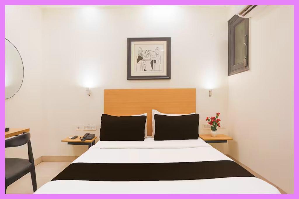 En eller flere senge i et værelse på Hotel Noble Stay Near APJ Park