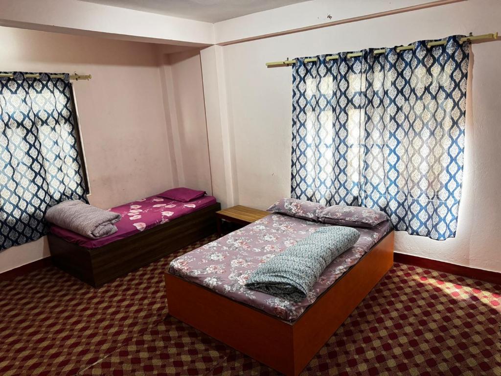 En eller flere senge i et værelse på new hotel gaule