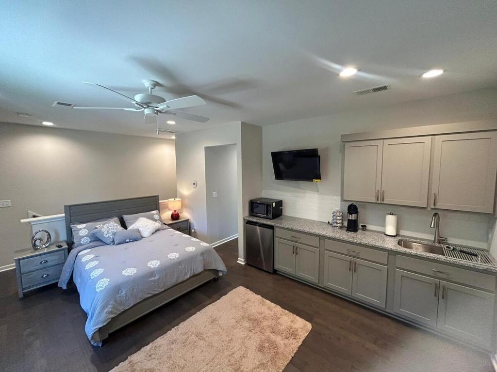 En eller flere senge i et værelse på The Magnolia Suite