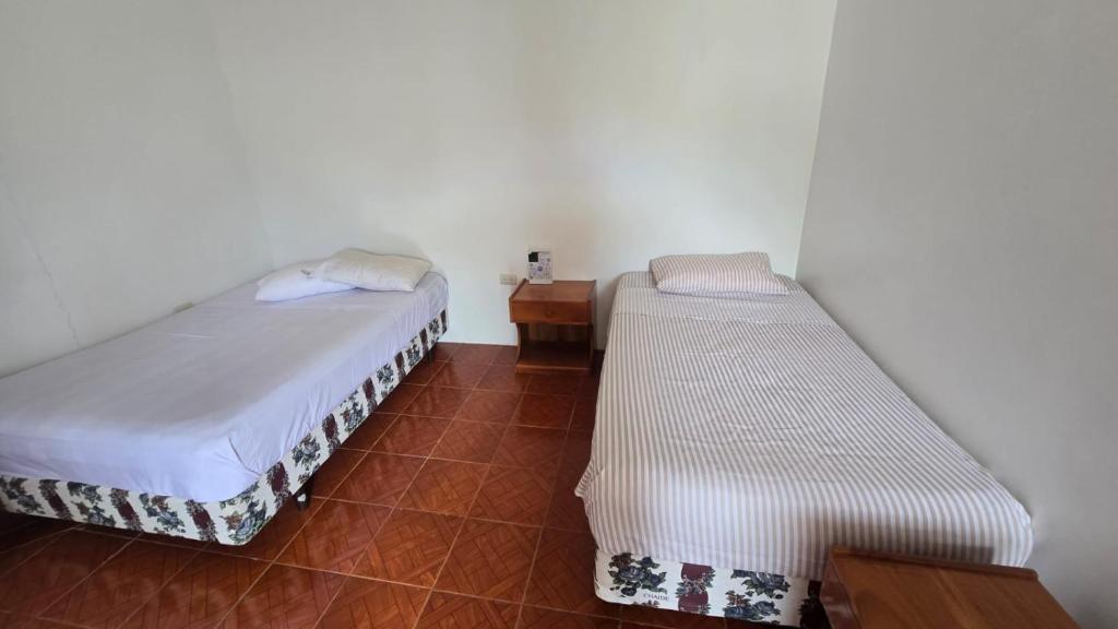 En eller flere senge i et værelse på Habitación Almar