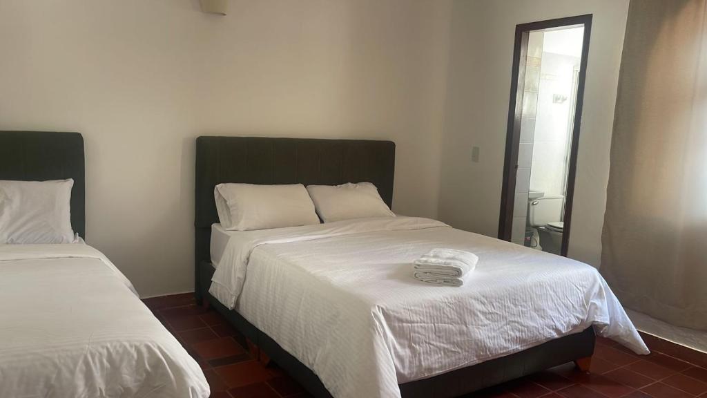 En eller flere senge i et værelse på Once once PLUS