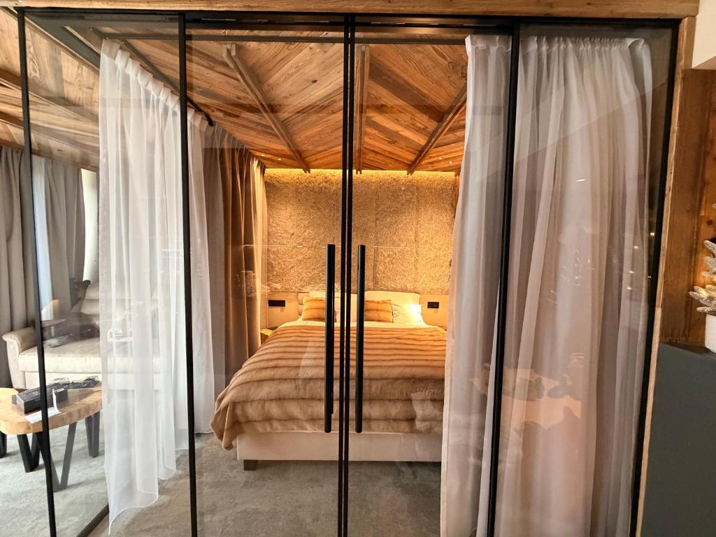 Postel nebo postele na pokoji v ubytování Giewont View Sośnica Residence & Spa