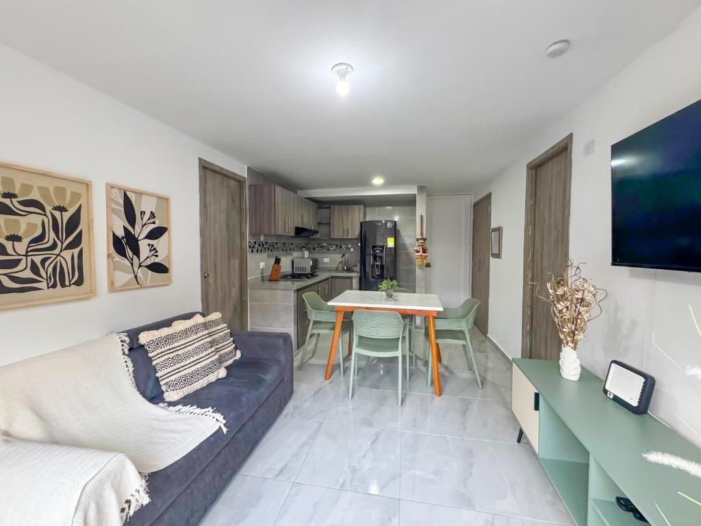 Et tv og/eller underholdning på Apto moderno con AC y Excelente Ubicacion