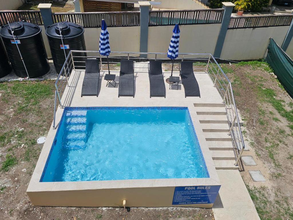 Swimmingpoolen hos eller tæt på Belle Vue Comforts