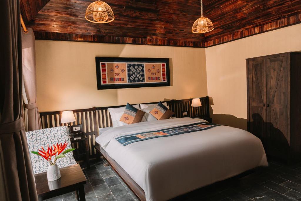 Postel nebo postele na pokoji v ubytování Tràng An Valley Retreat