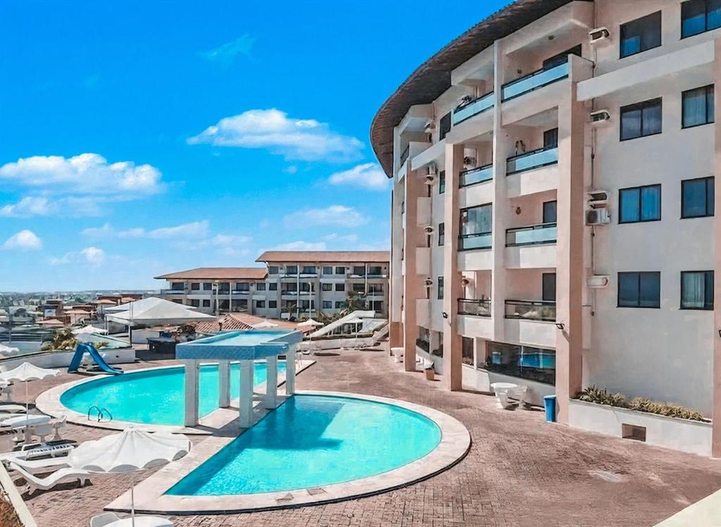 Swimmingpoolen hos eller tæt på Studio no Porto das Dunas vista mar e Beach Park!