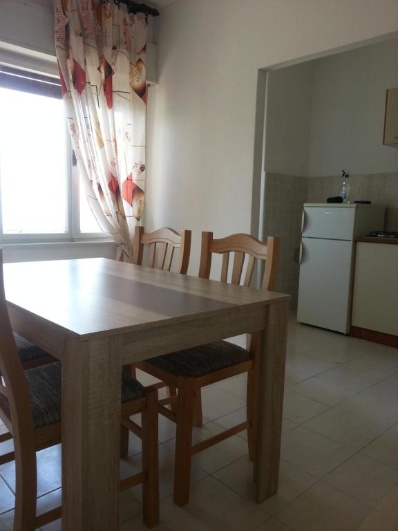 Kuchyňa alebo kuchynka v ubytovaní Apartment Vivoda