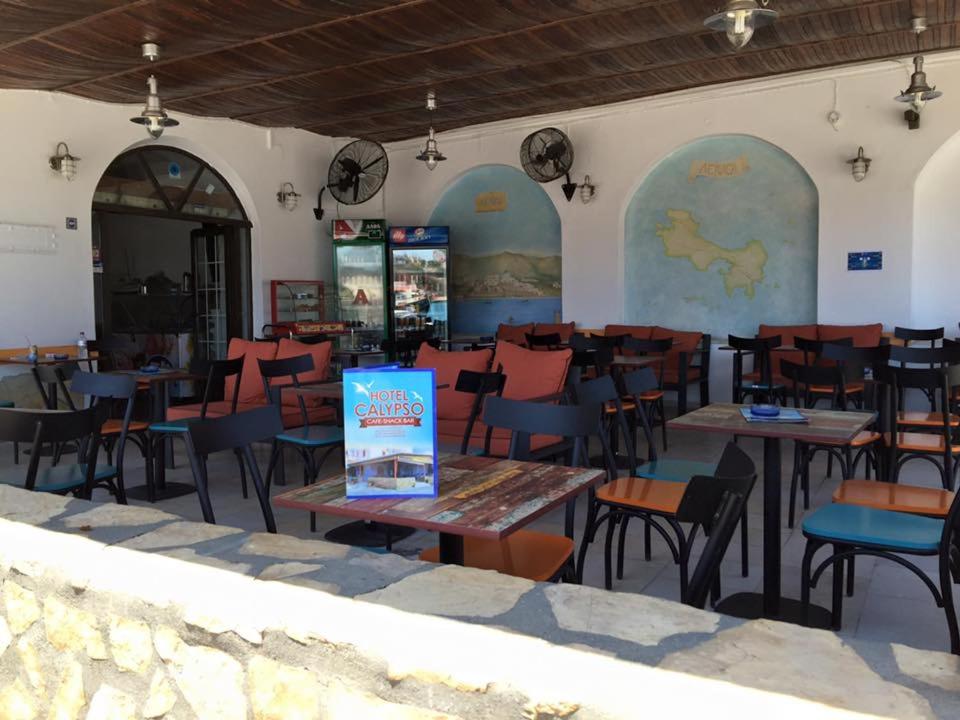 A restaurant or other place to eat at Calypso Hotel