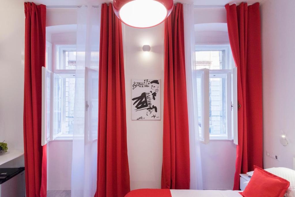 Postel nebo postele na pokoji v ubytování Art Room Split