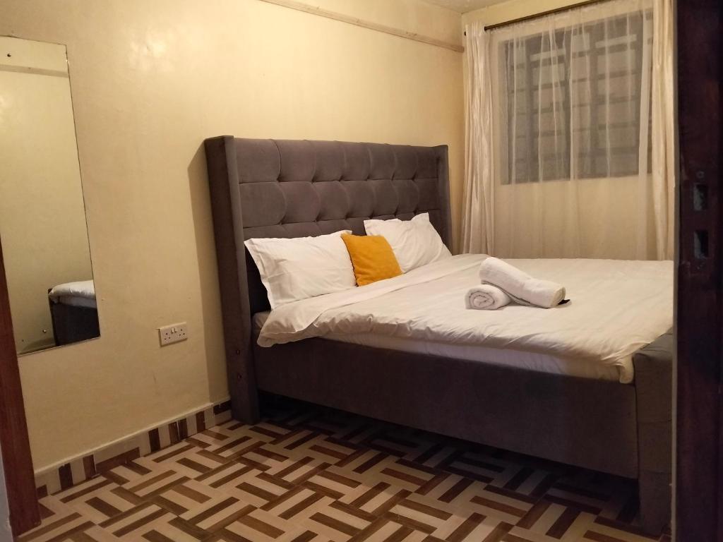 Postel nebo postele na pokoji v ubytování Cozyhub