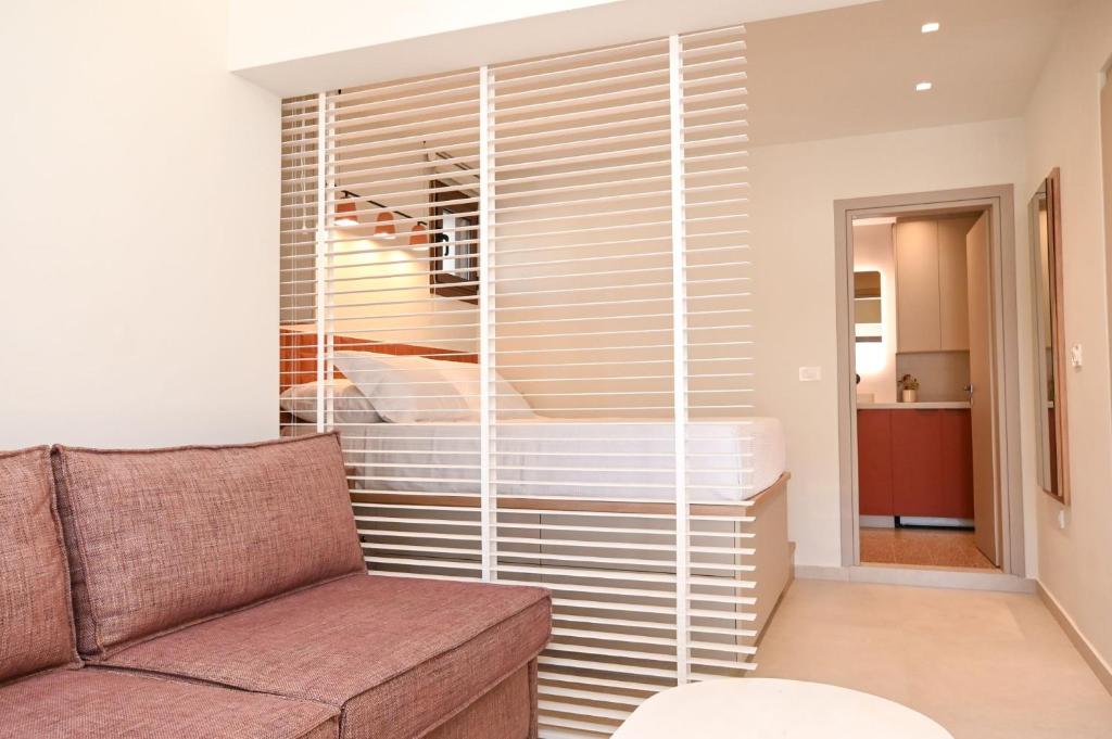 Et opholdsområde på Elvira's Apartments