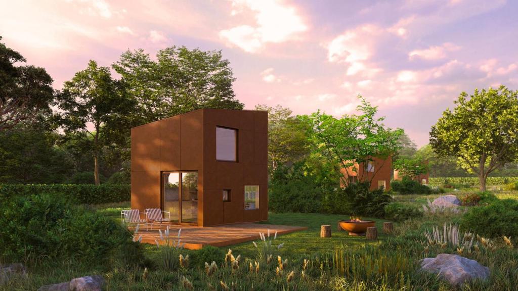 een klein huisje midden in een veld bij Oseraie Cabins - Wild lodges près de Maastricht in Visé