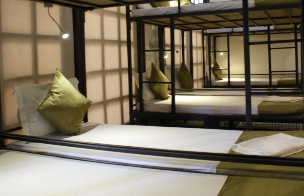 Postel nebo postele na pokoji v ubytování BedHubs