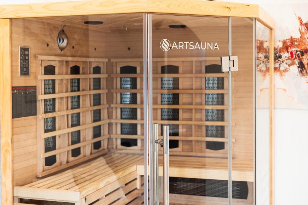 a display case in a store with a glass door at Weinblick Sauna-Infrarot 2 Schlafzimmer in Saarburg