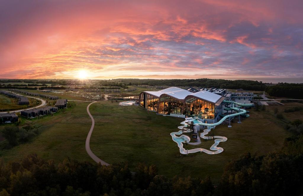 an aerial view of a resort at sunset at Center Parcs Nordborg Resort in Nordborg