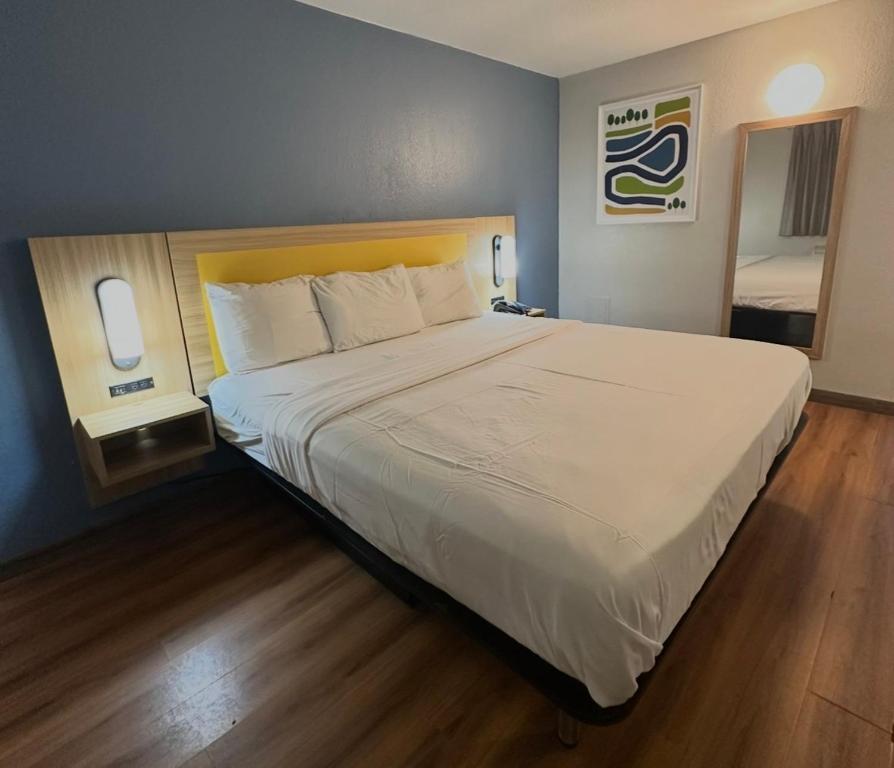 Ένα ή περισσότερα κρεβάτια σε δωμάτιο στο Park Inn by Radisson