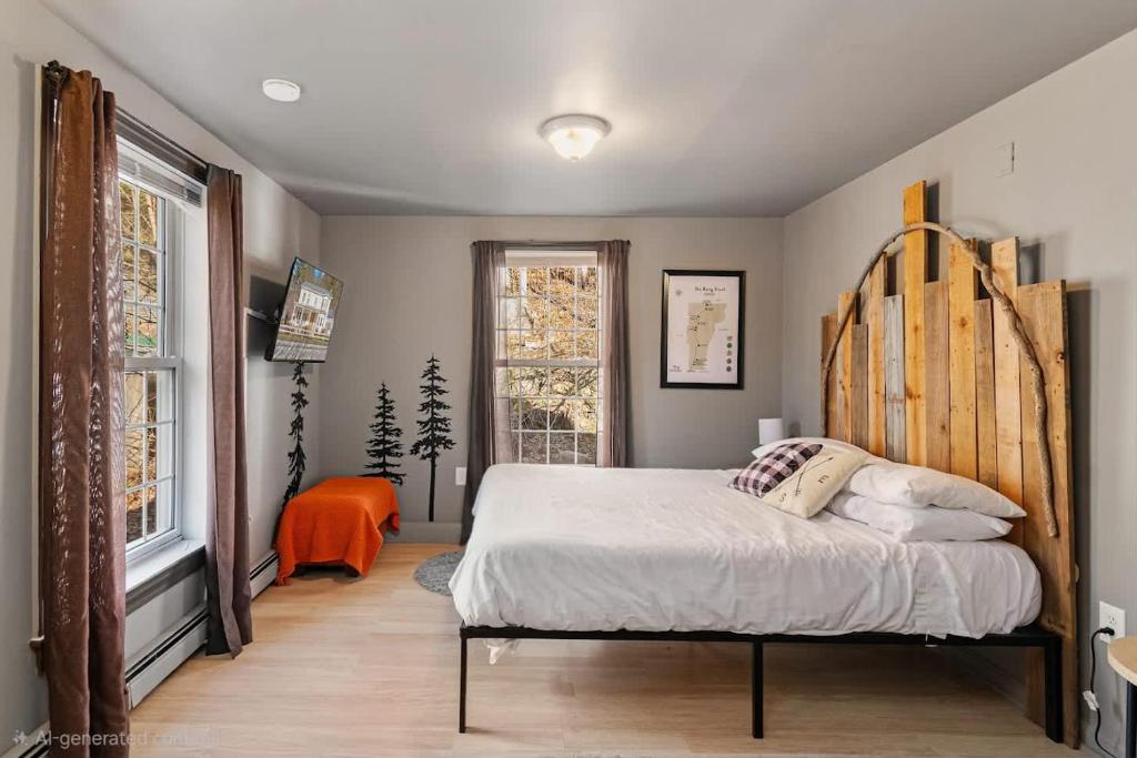 En eller flere senge i et værelse på 10 Min to Mountains Long Trail Suite