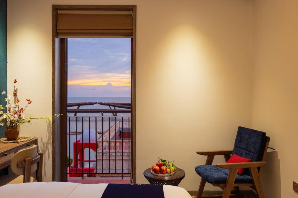 En eller flere senge i et værelse på ZAO Hotel Firework & Sea View