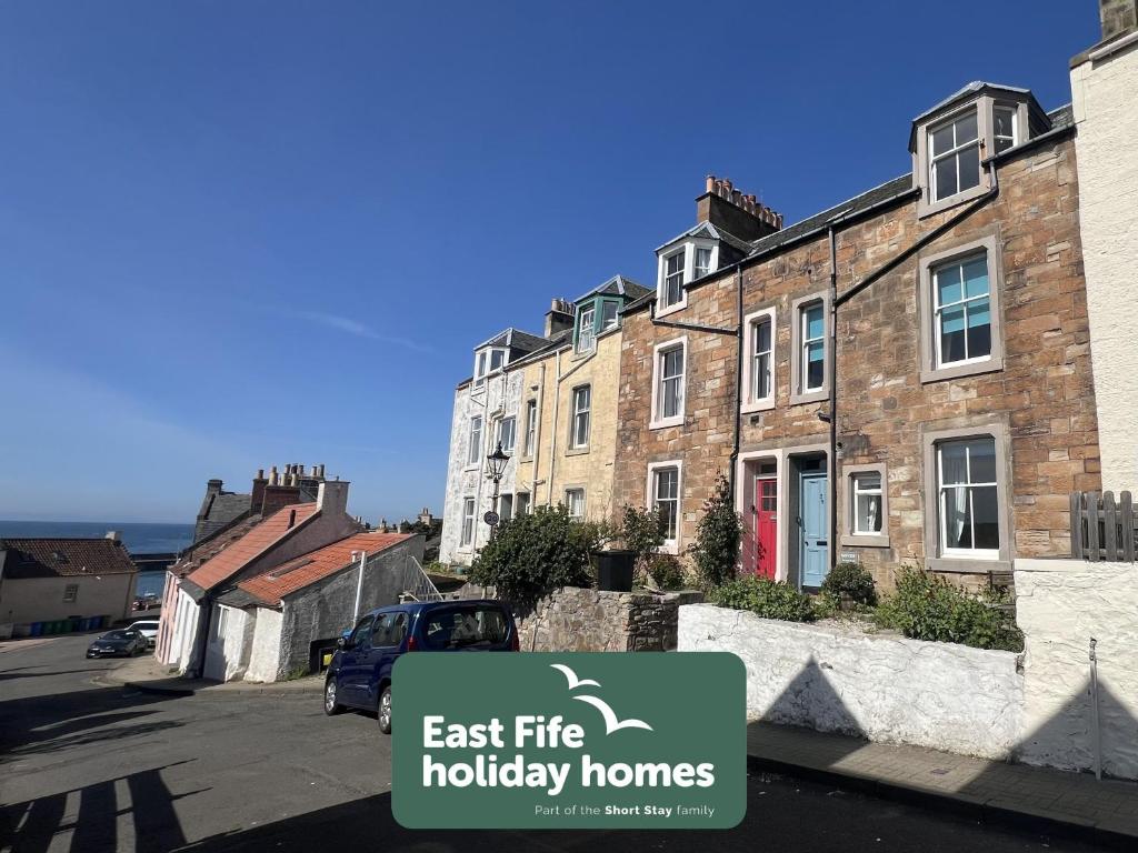 een bord met de tekst 'oostelijke brand vakantiehuizen' bij Bayview - St Monans in Saint Monance